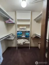 Spacious, well-lit walk-in closet in primary bedroom!