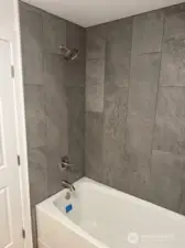 Tile looks so Great, goes right up to the ceiling!