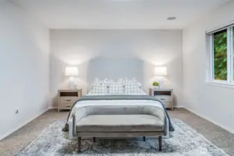 A serene and spacious master suite offering a private retreat