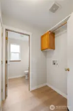 Laundry and mudroom with direct garage access, perfect for drop zones, coats, shoes, and busy lifestyles.