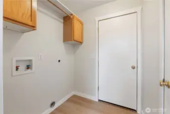 Laundry and mudroom with direct garage access, perfect for drop zones, coats, shoes, and busy lifestyles.