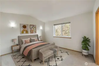 Virtually Staged. Light-filled primary suite with soaring vaulted ceilings, ambient sconces, peaceful territorial views, plus a walk-in closet and 5-piece ensuite including tub.