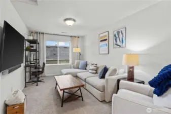 Upstairs loft is perfect for anything you need--another living room, an office, play space, a library....
