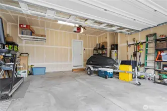 Attached garage with Liftmaster quiet close door with auto-close capabilities