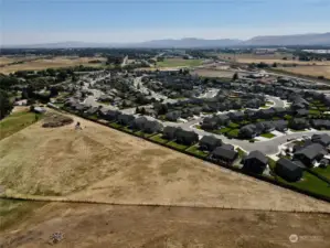 Looking east over property toward town