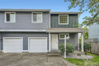 1 OF 5 TOP PHOTOS: Corner townhouse unit at the end of the street brings lots of privacy.