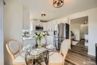 Luxury vinyl planks (waterproof) grace the entire first floor area and give a nice modern touch.