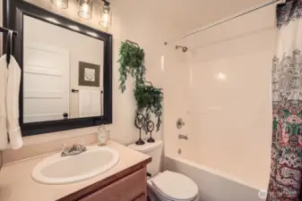Modern full-size bathroom is shared with the 2nd and 3rd bedrooms.
