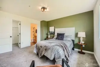 3 OF 5 TOP PHOTOS: Spacious primary bedroom with walk-in closet and full size bathroom.
