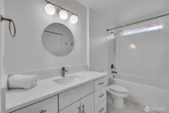 second floor full bath, quartz counter tops ceramic tile floor