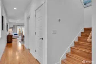Hall towards open concept kitchen dining living