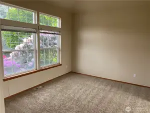 Family room with wood burning fireplace