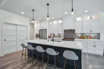 Clean, crisp kitchen with extended lighted cabinets