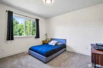 One of the fine rooms with a view of trees, large closet