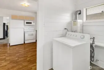 Laundry room off kitchen.