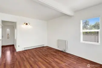 1st floor bedroom with no closet, or a second living area.