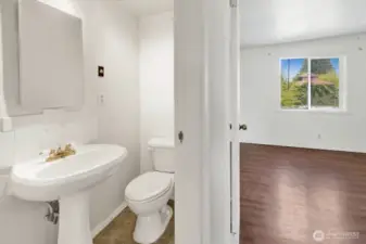 2nd floor half bath located between bedrooms at top of the stairs.