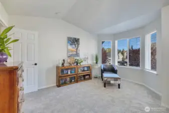 Seating area in primary with bay windows