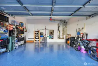 Large 2 car garage with overhead storage & new epoxy flooring