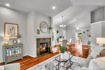 Cozy up to fireplace in living room.