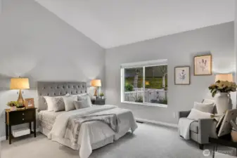 Primary bedroom on main level  with nearly new carpeting over Brazilian hardwood.