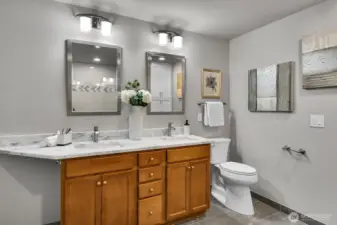 Primary bath with double vanity, quartz counter.