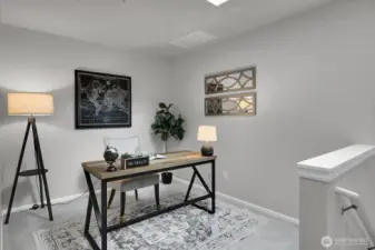 Upper level loft can easily transform to office, playroom or fitness area.