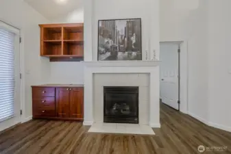 Wonderful & cozy gas fireplace, built-in cabinet to the side of your fireplace for all your electronics, books, etc. Your tv can be mounted above the fireplace or to the left