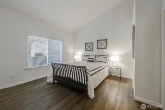 Spacious Primary suite on the main floor with vaulted ceilings