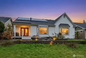 Aglow, set back from the Fairway.