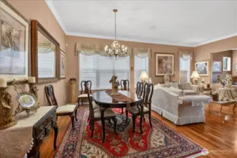 Your Dining Room is fully furnished including this gorgeous Cherry Dining Set and there are two more leaves for larger affairs.