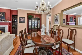 Elegance abounds with a stately chandelier, China cabinet, and whole-house sound system to set the mood.