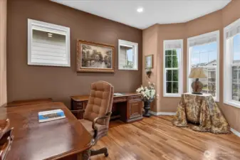 Your smartyly positioned Den inside the entrance is ready to get to work. All furnishings including a large desk, computer desk with hookups, matching book shelves, cross lighting and a Bay Window.