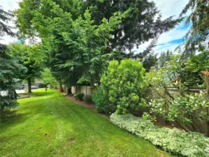 Enjoy the privacy of a lush green buffer that beautifully separates this home from neighboring properties. The well-maintained common space offers a serene and natural backdrop, enhancing the tranquility of your living environment.