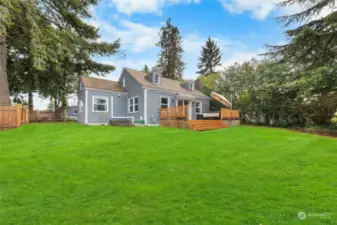 Fully fenced yard with so much room to run and play