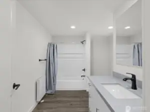 Primary Ensuite full bath - excellent counter space and storage.