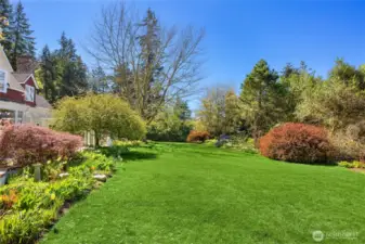 Mature gardens plus lush lawns make this property extra special.