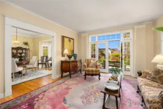 Western facing and dramatic views from the formal living room. An ideal room for entertaining with a seamless transition to the patio, formal dining and kitchen beyond.