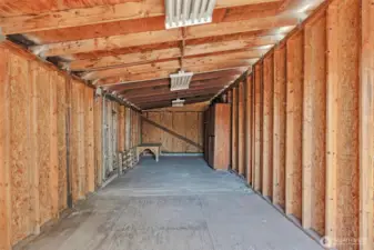 Large storage area with doors on side and end for easy access
