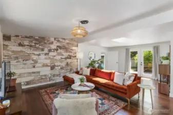 Living area with French doors leading to your lake front backyard! Gorgeous water views from these French doors!