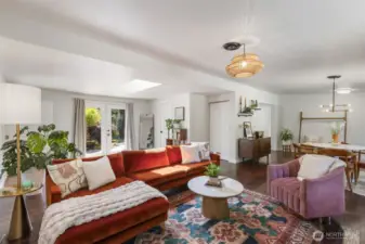 Living space looking onto the dining and French doors to your lake front back yard oasis!