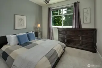 One of three bedrooms on the upper level, with ensuite.