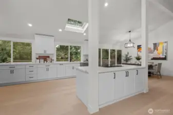 Storage space abounds with island cabinetry, as well as uppers and lowers.