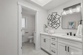 A second full bathroom upstairs with plenty of sinks so no one has to share.