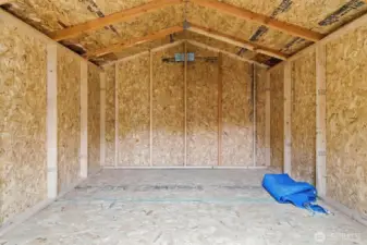 Large clean shed ready for all of your garden supplies.