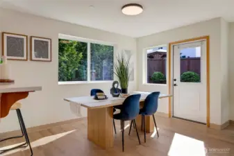 Large eat in kitchen with door leading to back yard