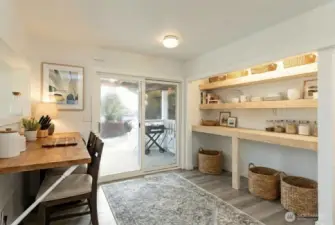 Bonus pantry/mudroom off the kitchen, digitally staged.