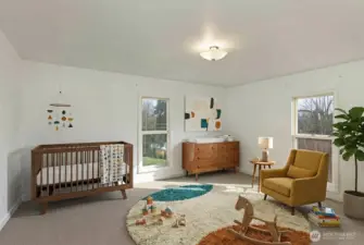 Bedroom 3 of 4 upstairs. Digitally staged.