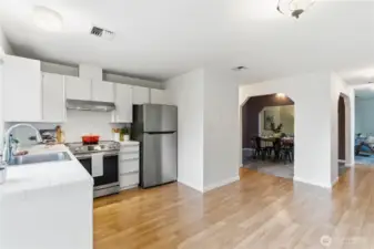 View to the formal dining room and living room beyond.