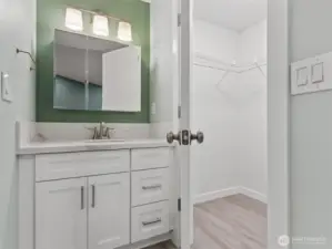 Primary walk in closet.